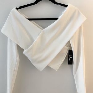Beautiful off the shoulders top. Brand new w/tags!